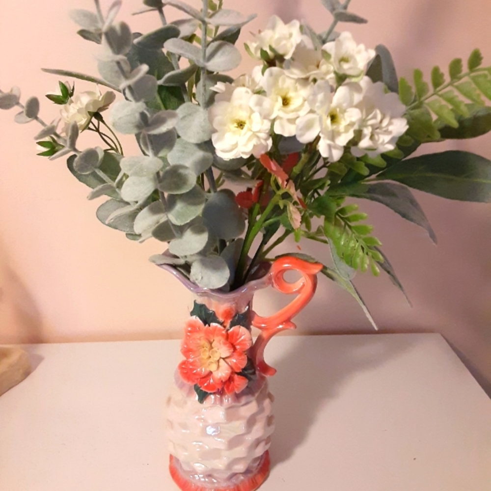 Vintage vase with floral decor